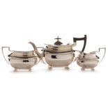 Three piece silver tea service by Walker and Hall