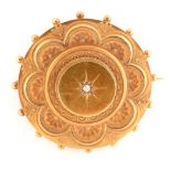 A Victorian 15ct yellow gold roundel brooch