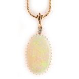 Opal and diamond pendant on chain