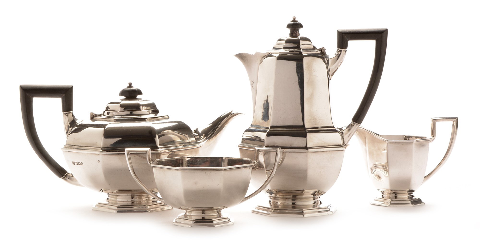 A four piece silver tea service