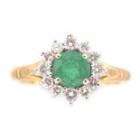 Emerald and diamond cluster ring