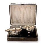 A pair of cased silver sauce boats