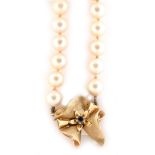 Cultured pearl necklace with sapphire set gold clasp