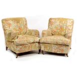 A pair of Howard & Sons armchairs