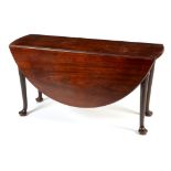 19th Century mahogany drop leaf dining table