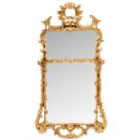 A modern two plate rococo wall mirror