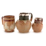 Three Doulton Victoria commemorative jugs