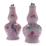 Pair of Chinese famille rose vases and covers