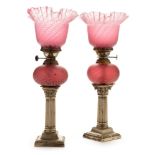 Pair of electroplate lamps with pink and white shades