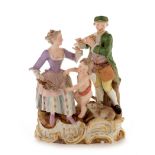 Meissen group cupid and figures