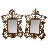 A pair of gilt metal easel mirrors