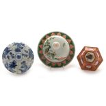 Three Chinese porcelain vase covers.