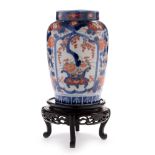 Japanese Imari vase and wood stand