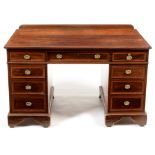 A 20th Century mahogany pedestal desk