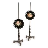 Pair of reproduction black lacquer pole screens
