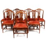 A set of eight 20th Century mahogany dining chairs