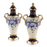 Pair of Coalport bone china vases and covers