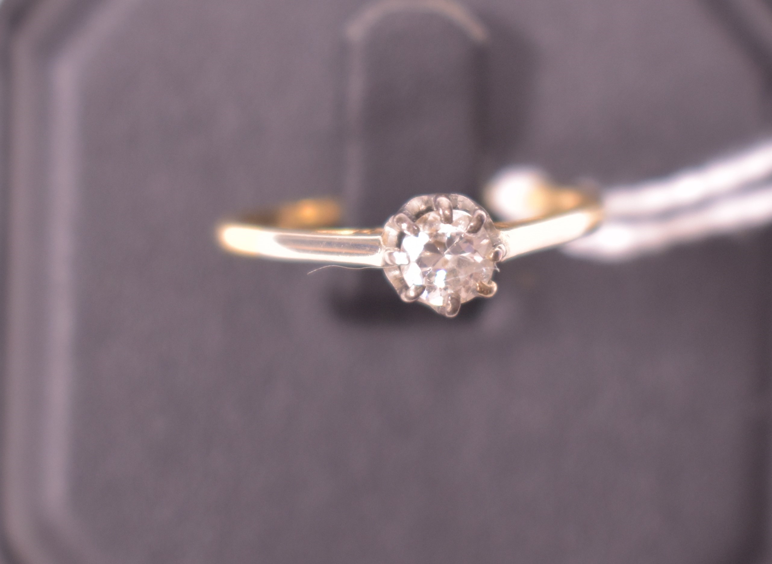 A solitaire diamond ring