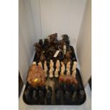 African and Oriental carved figures and resin chess pieces