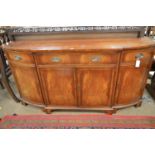 Regency style mahogany and yew banded breakfront sideboard