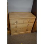 A limed pine chest of drawers