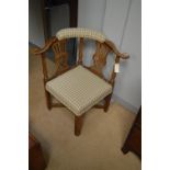 A Georgian beechwood corner chair.