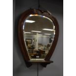 20th Century mahogany horseshoe shaped mirror