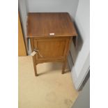 A mahogany pot cupboard.