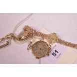 Three gold cased wristwatches