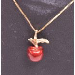 Gold and enamel apple pendant on chain