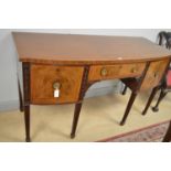 A Georgian mahogany bowfront sideboard.