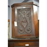 A Victorian mahogany corner cabinet