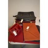 Three leather document cases