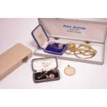 Gold cufflinks and costume jewellery