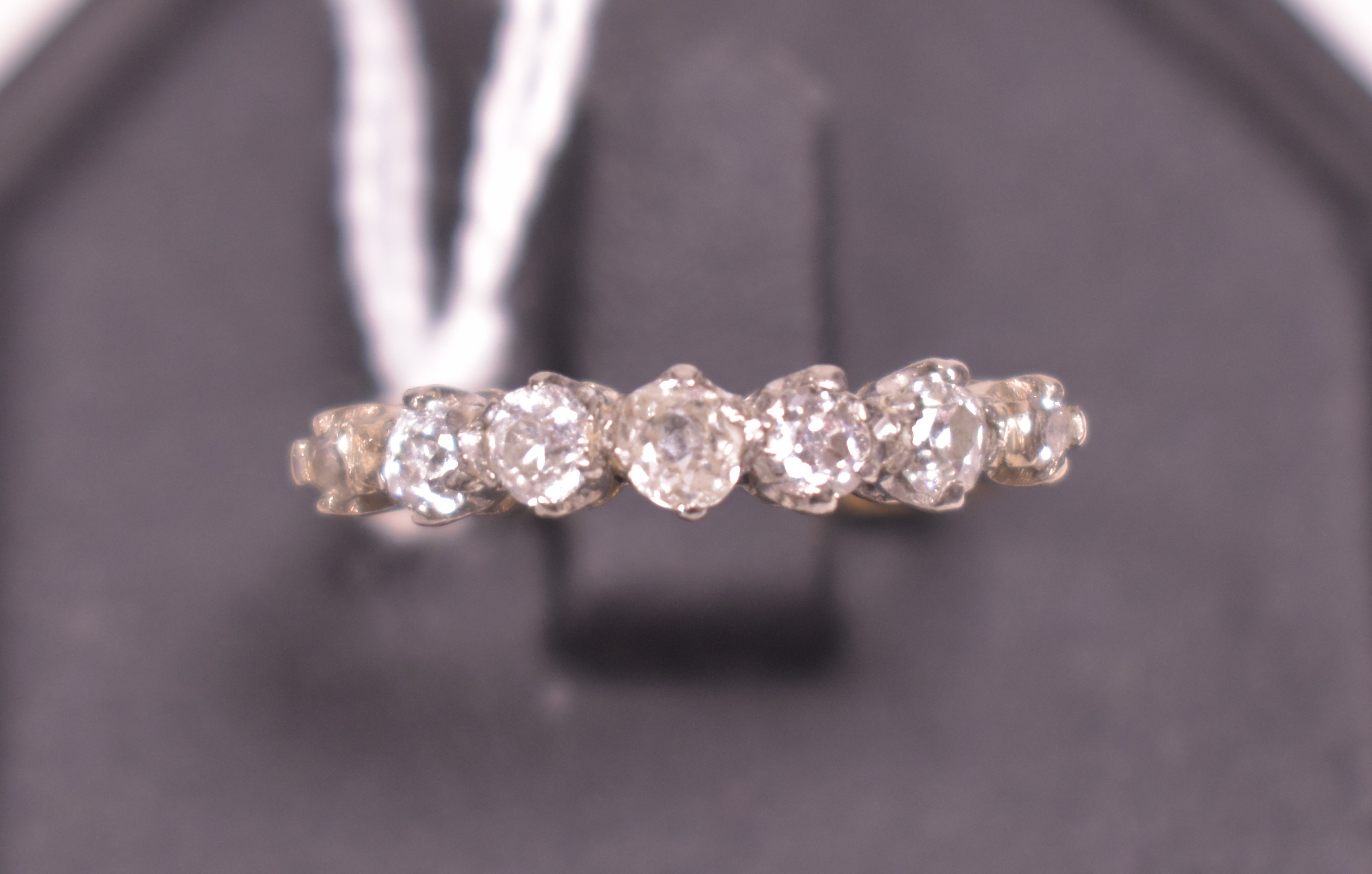 A seven stone diamond ring