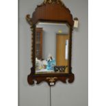 A Georgian style wall mirror.