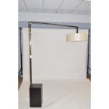 Modenature Move Inox floor lamp supplied for an early project by Fiona Barratt Interiors.