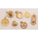 Seven gold pendants