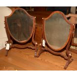 A pair of 20th Century toilet mirrors