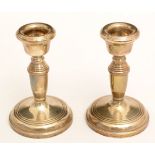 A pair of silver candlesticks