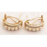 A pair of cultured pearl and diamond earrings