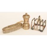 Silver pepper grinder, toast rack and pin pot