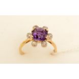 An amethyst and diamond ring