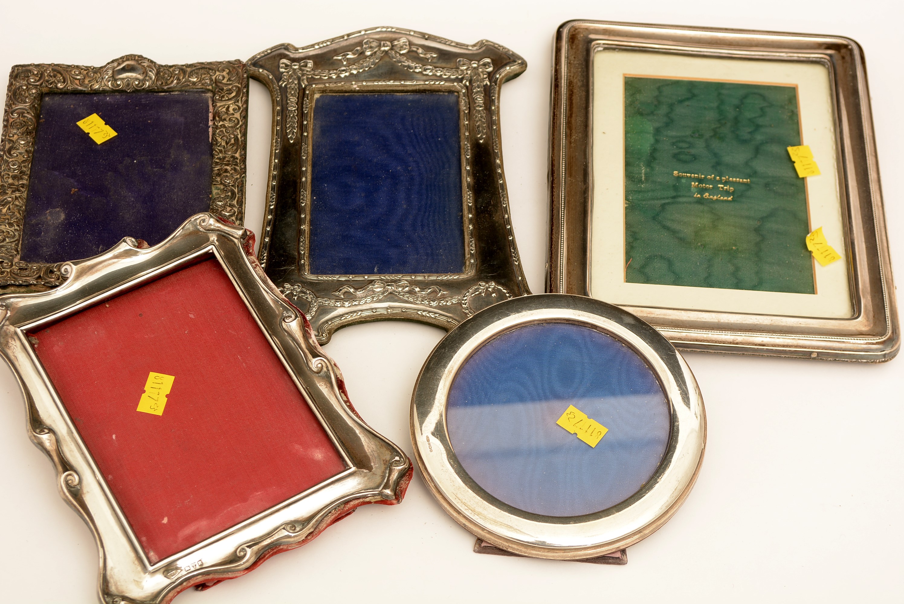 Five silver photograph frames