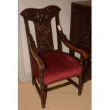 Early 20th Century oak carved armchair