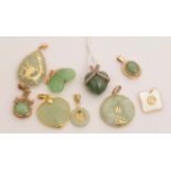 Jade and other green stone pendants