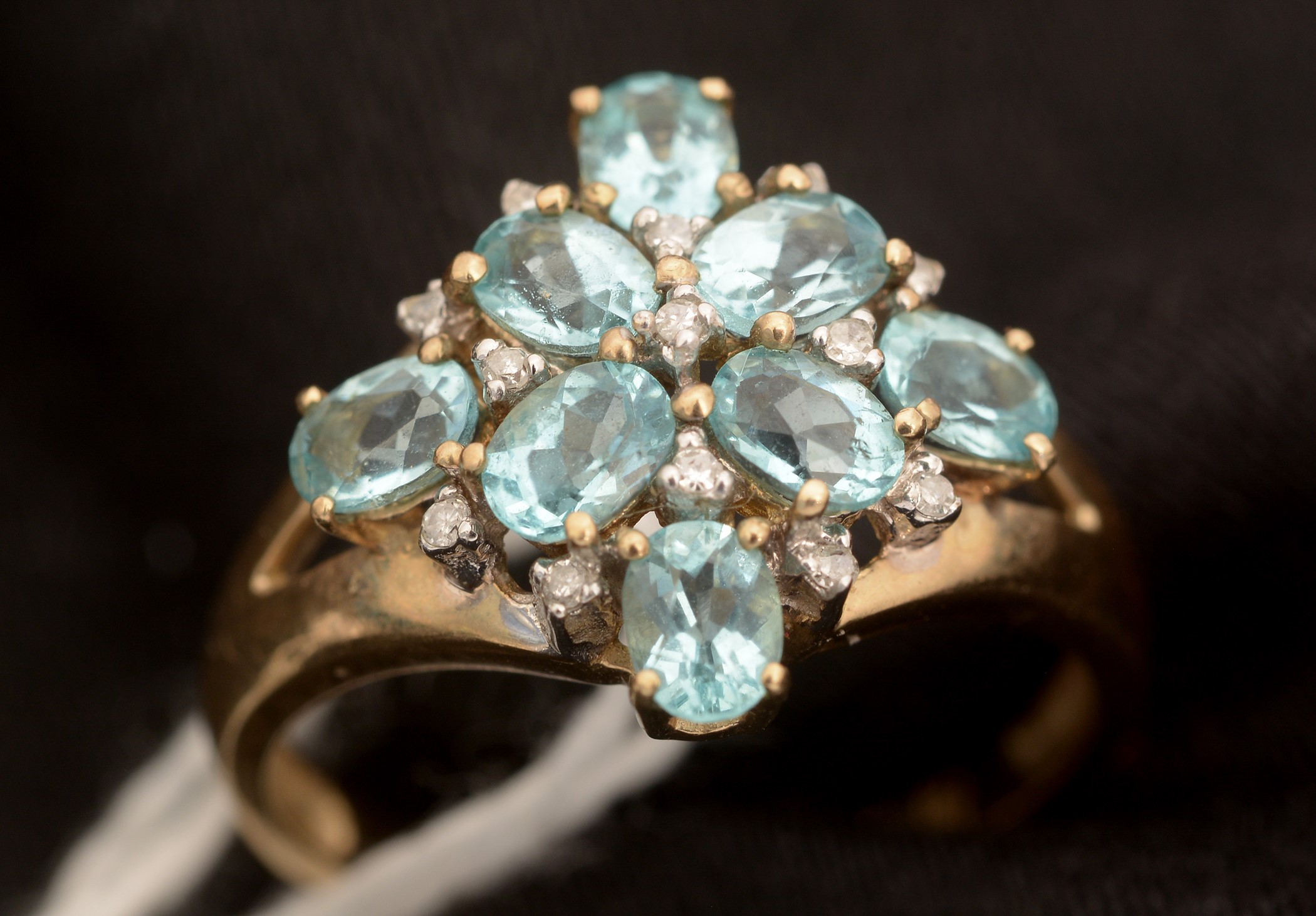 Light blue stone and diamond ring