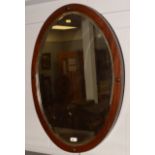 Edwardian mahogany framed bevelled mirror.