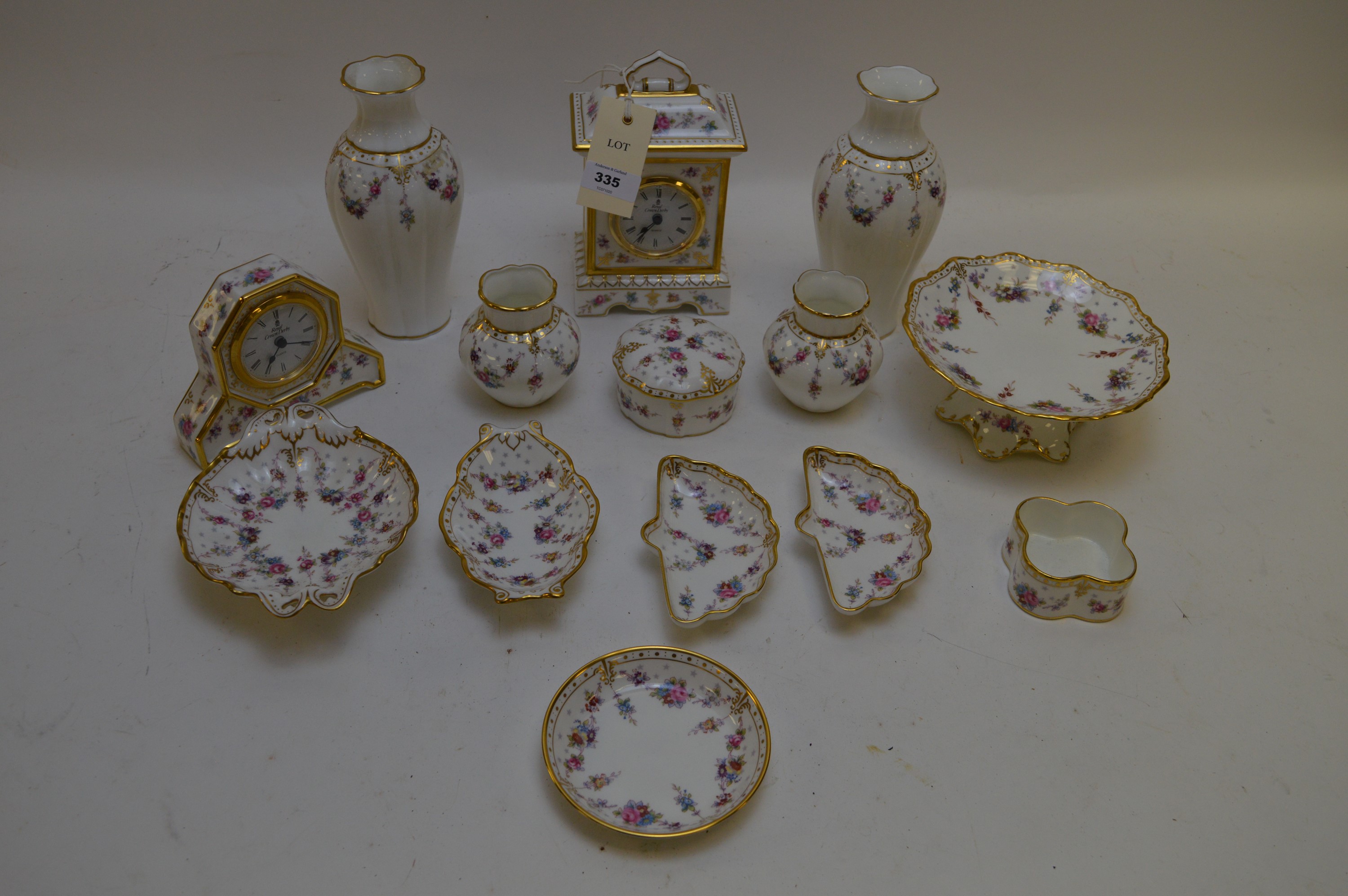 Royal Crown Derby 'Royal Antoinette' pattern clocks, vases and dishes.