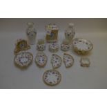Royal Crown Derby 'Royal Antoinette' pattern clocks, vases and dishes.